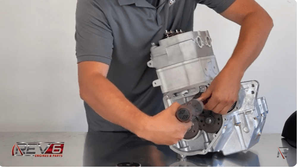 re-securing camshaft b y tightening the nut