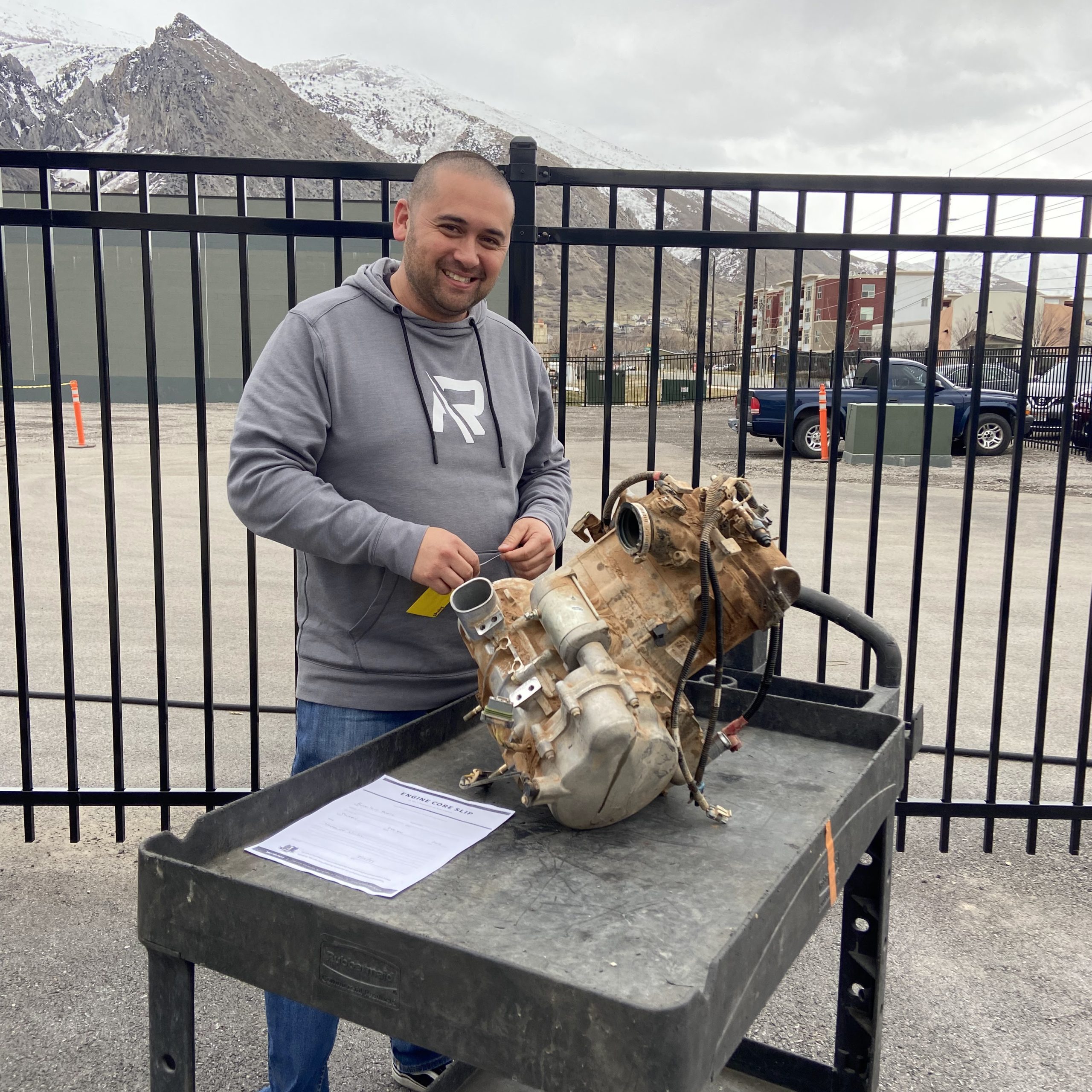 Gary from REV6 accepting a used engine core as part of the REV6 core program